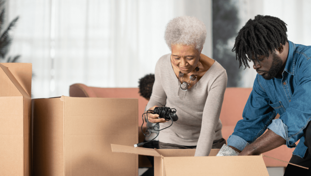 moving elderly parents into your home - helping mom unpack